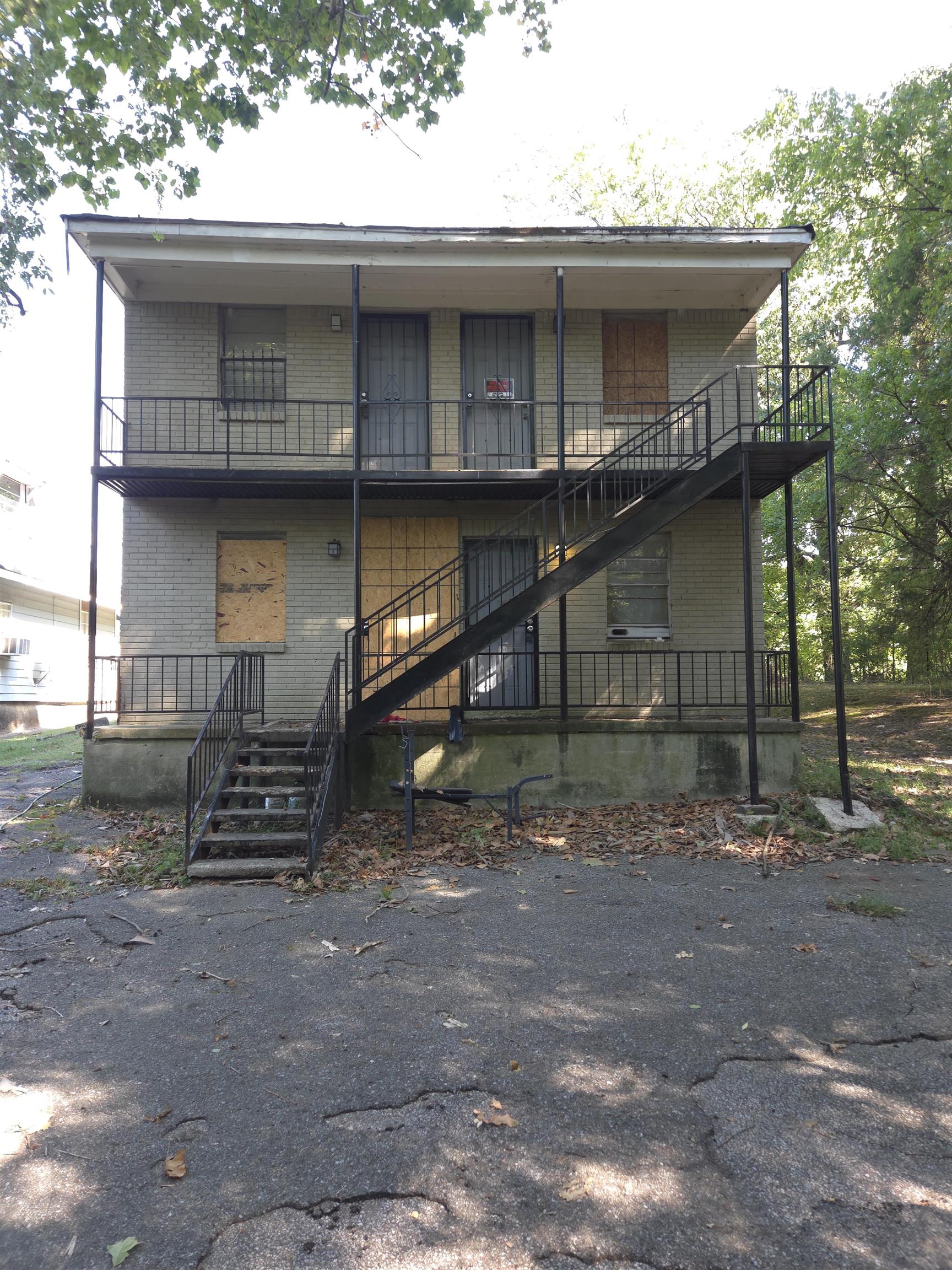 1535 Gaither Street, Unit 14 Memphis, TN 38106 - Photo 2 of 3 a view of a house with a yard