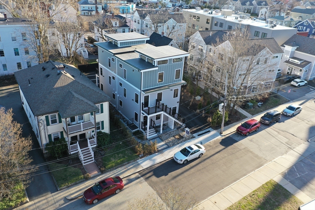 15 Alder Street, Unit 1 Waltham, MA 02453 - Photo 33 of 38 an aerial view of residential houses with outdoor space