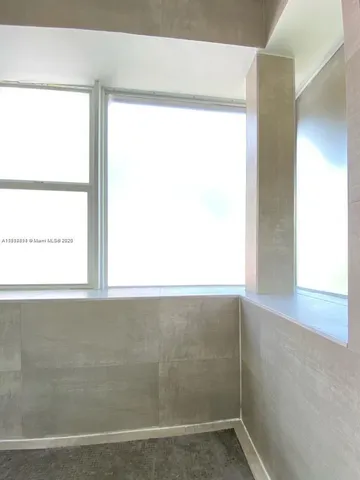 a view of a small space with a window