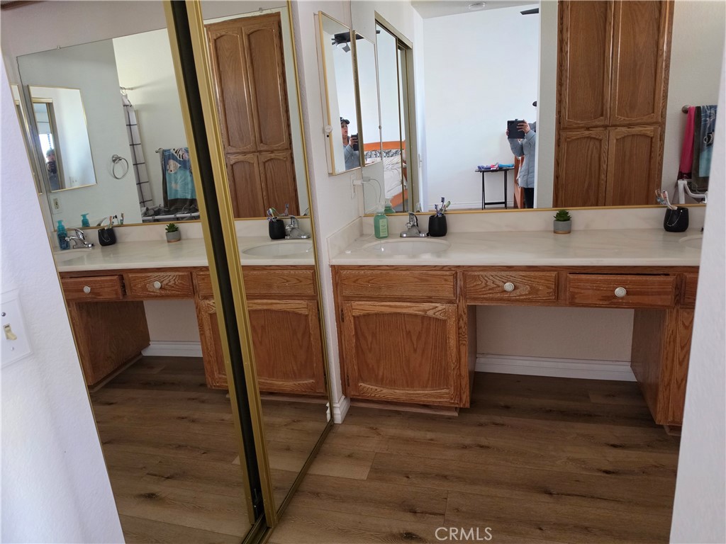 13502 Cuyamaca Road Apple Valley, CA 92308 - Photo 6 of 15 a bathroom with a sink and a mirror