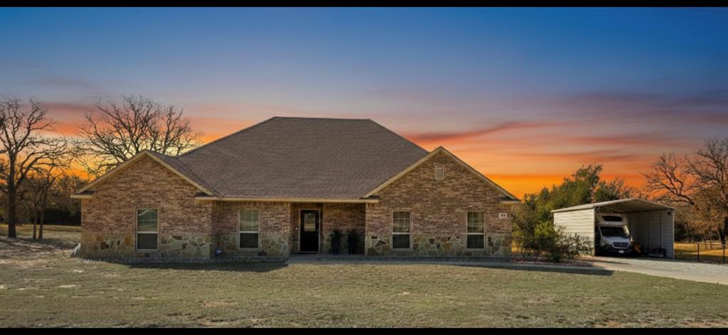 223 Cottongame Road Weatherford, TX 76088 - Photo 3 of 39 a view of a house with a yard