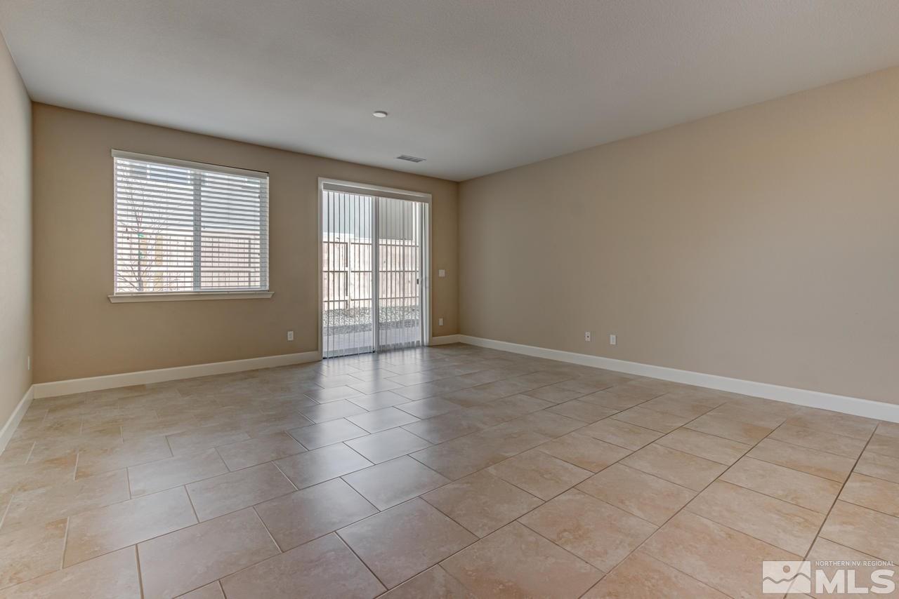 9728 Pachuca Drive Reno, NV 89521 - Photo 10 of 25 an empty room with windows