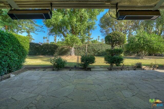 2264 Oakcrest Drive Palm Springs, CA 92264 - Photo 15 of 19 a view of a backyard of the house