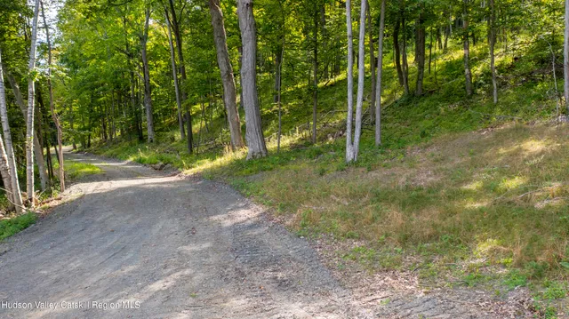 a view of a lake with sunset view