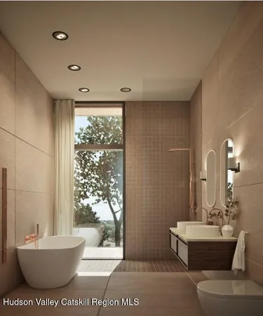 a bathroom with a toilet a sink and bathtub