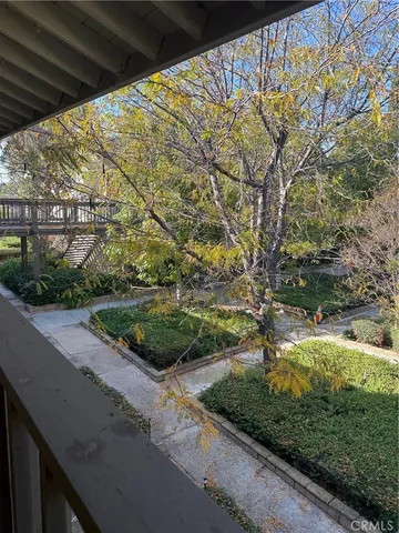 a view of a backyard of the house