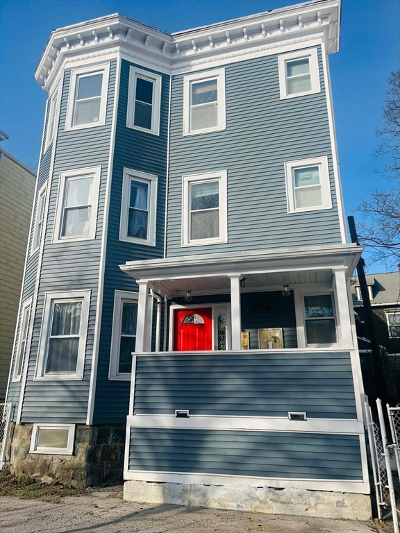 11 Doris Street, Unit 1 Boston, MA 02125 - Photo 16 of 17 a view of a building with many windows