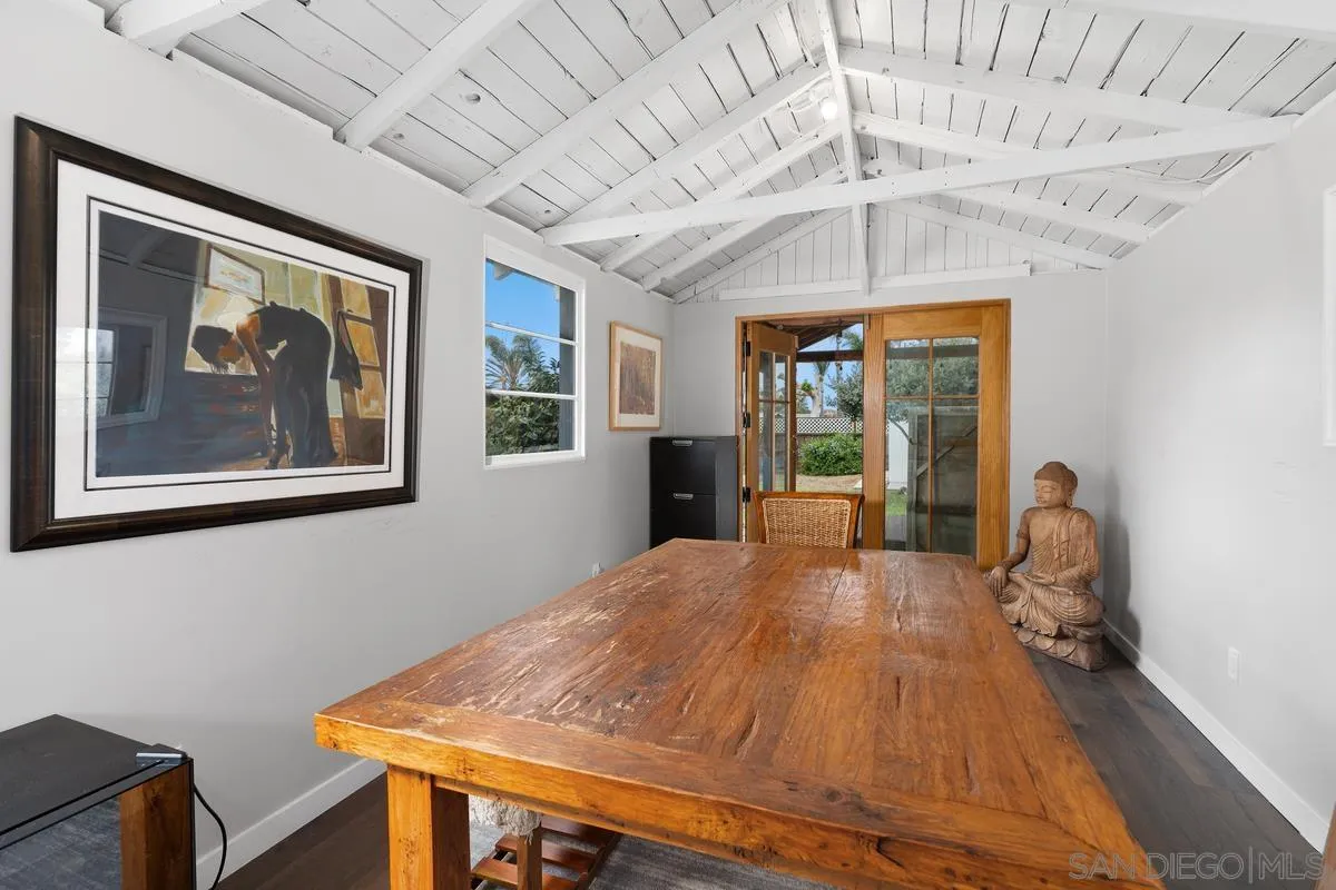 215 North Rios Avenue Solana Beach, CA 92075 - Photo 16 of 23 a bed sitting in a spacious bedroom next to a window