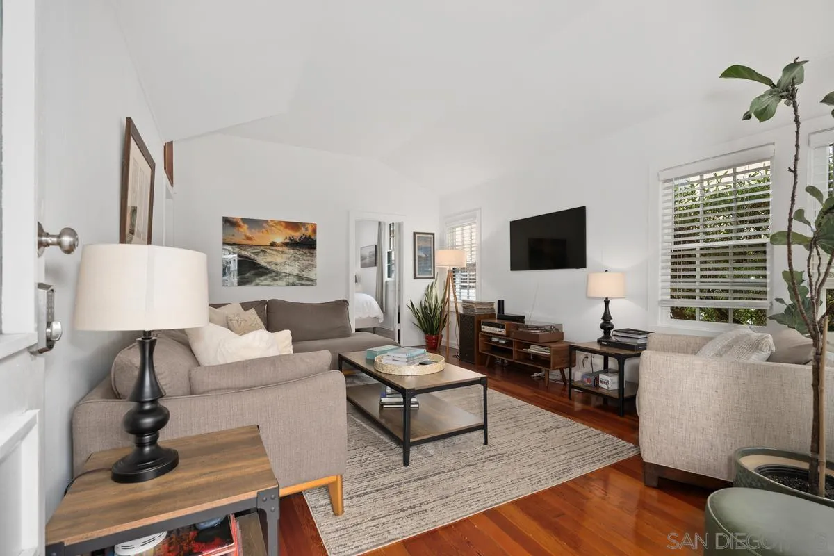 215 North Rios Avenue Solana Beach, CA 92075 - Photo 6 of 23 a living room with furniture flat screen tv and window