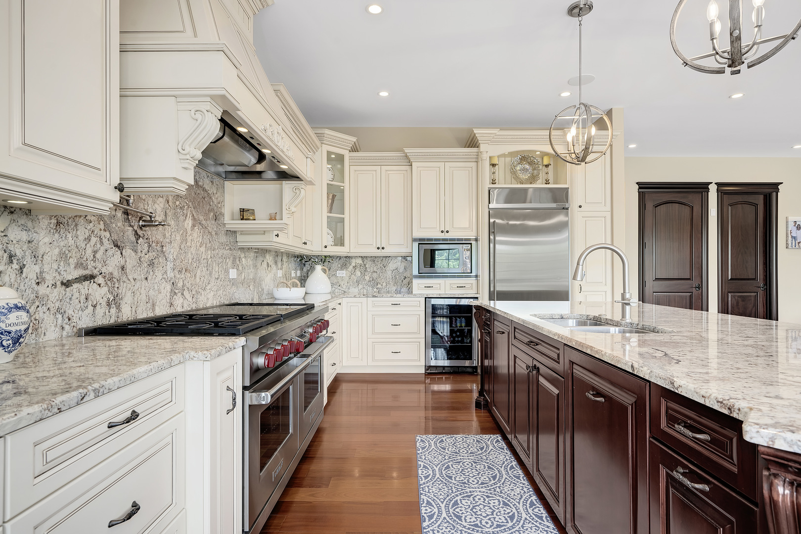 8511 Kearney Road Downers Grove, IL 60516 - Photo 23 of 71 a kitchen with stainless steel appliances granite countertop a sink stove and cabinets