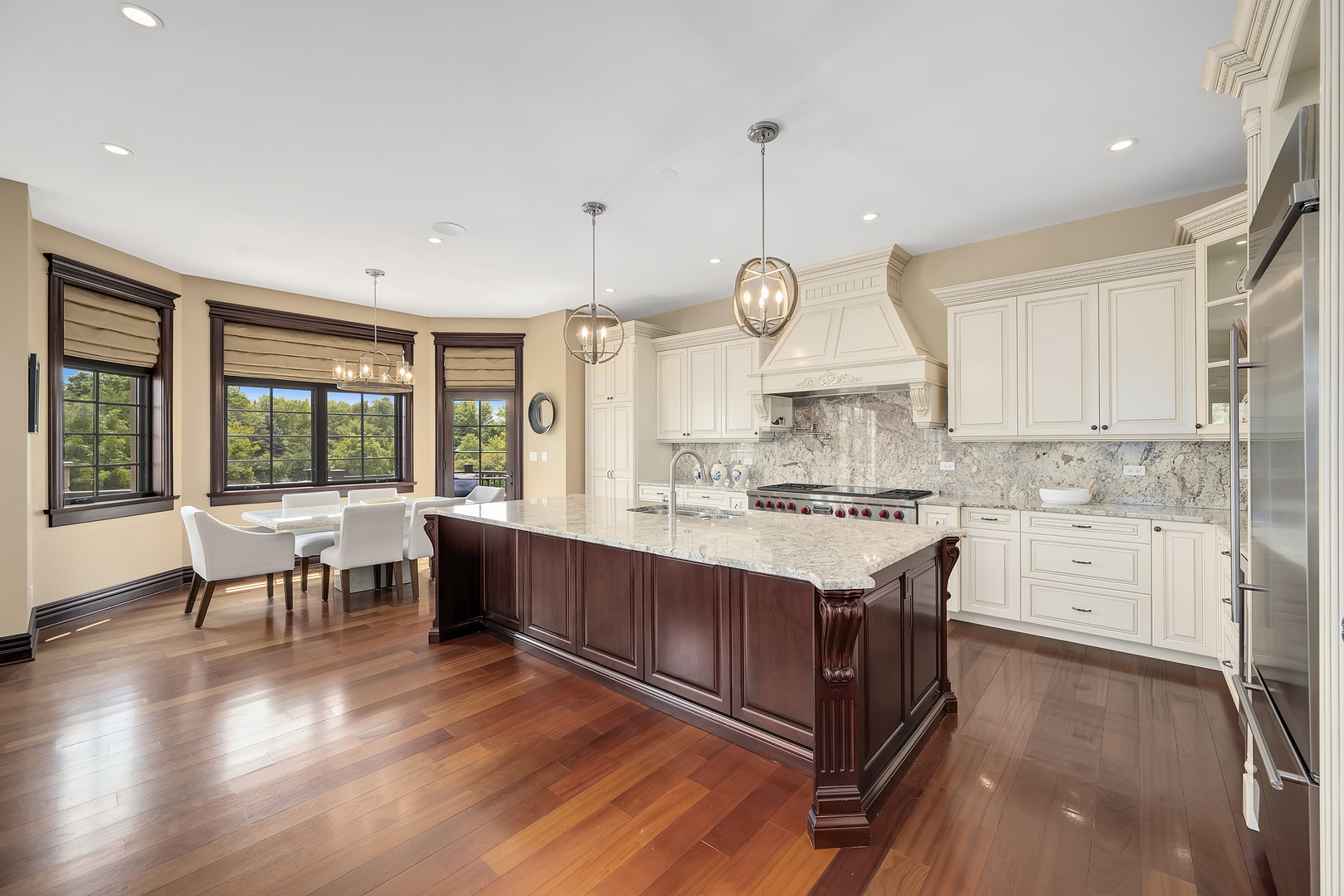 8511 Kearney Road Downers Grove, IL 60516 - Photo 28 of 71 an open kitchen with wooden floor and large window