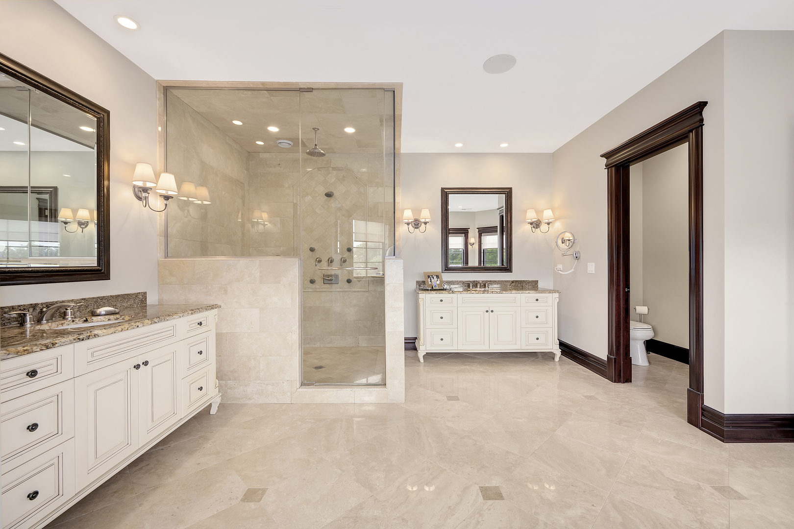 8511 Kearney Road Downers Grove, IL 60516 - Photo 47 of 71 a bathroom with a double vanity sink a mirror and a shower