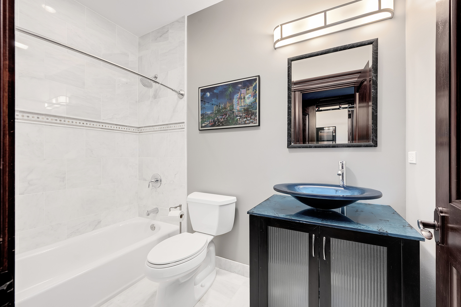 8511 Kearney Road Downers Grove, IL 60516 - Photo 51 of 71 a bathroom with a sink a toilet and shower