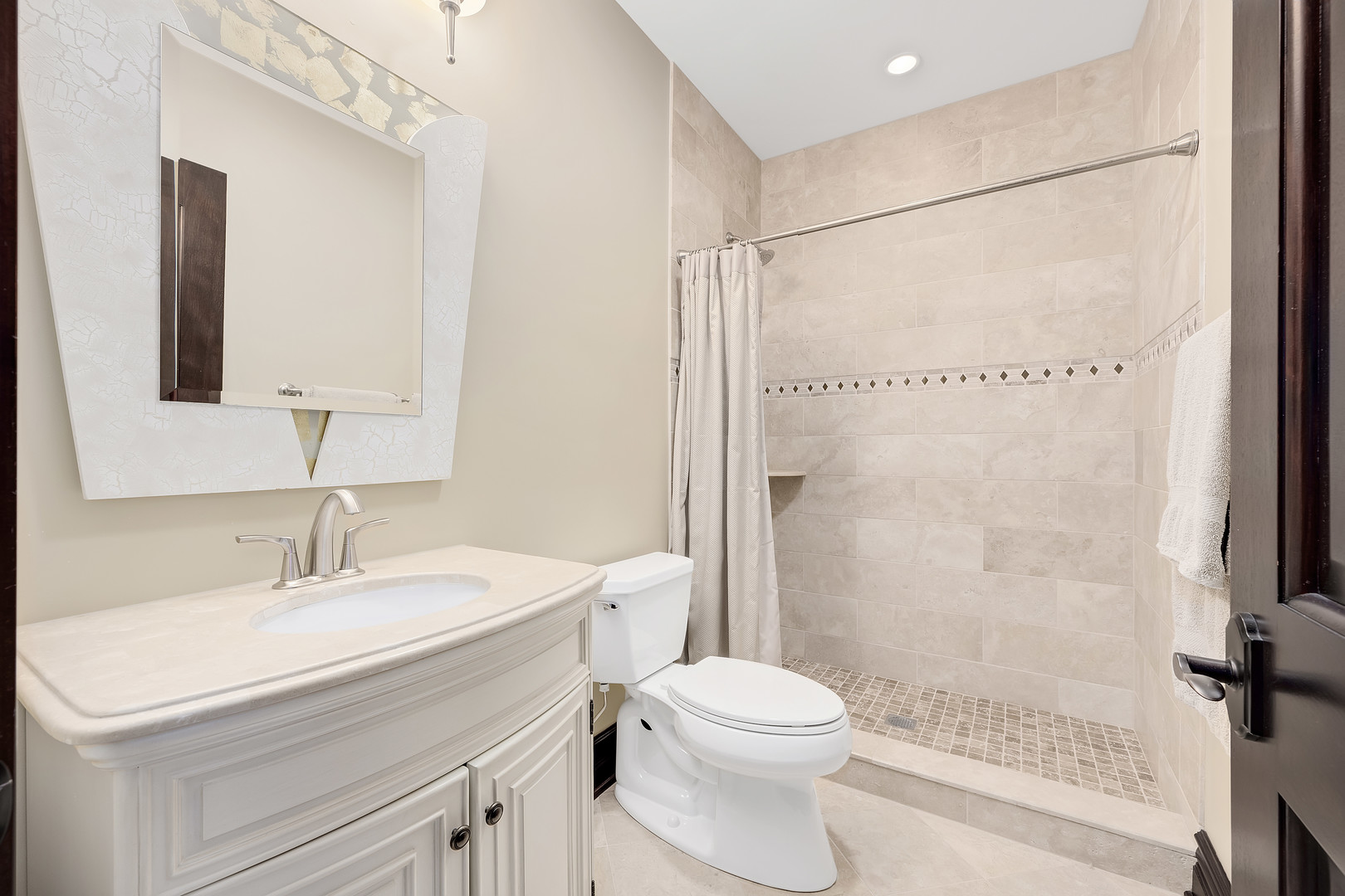 8511 Kearney Road Downers Grove, IL 60516 - Photo 53 of 71 a bathroom with a sink toilet and shower