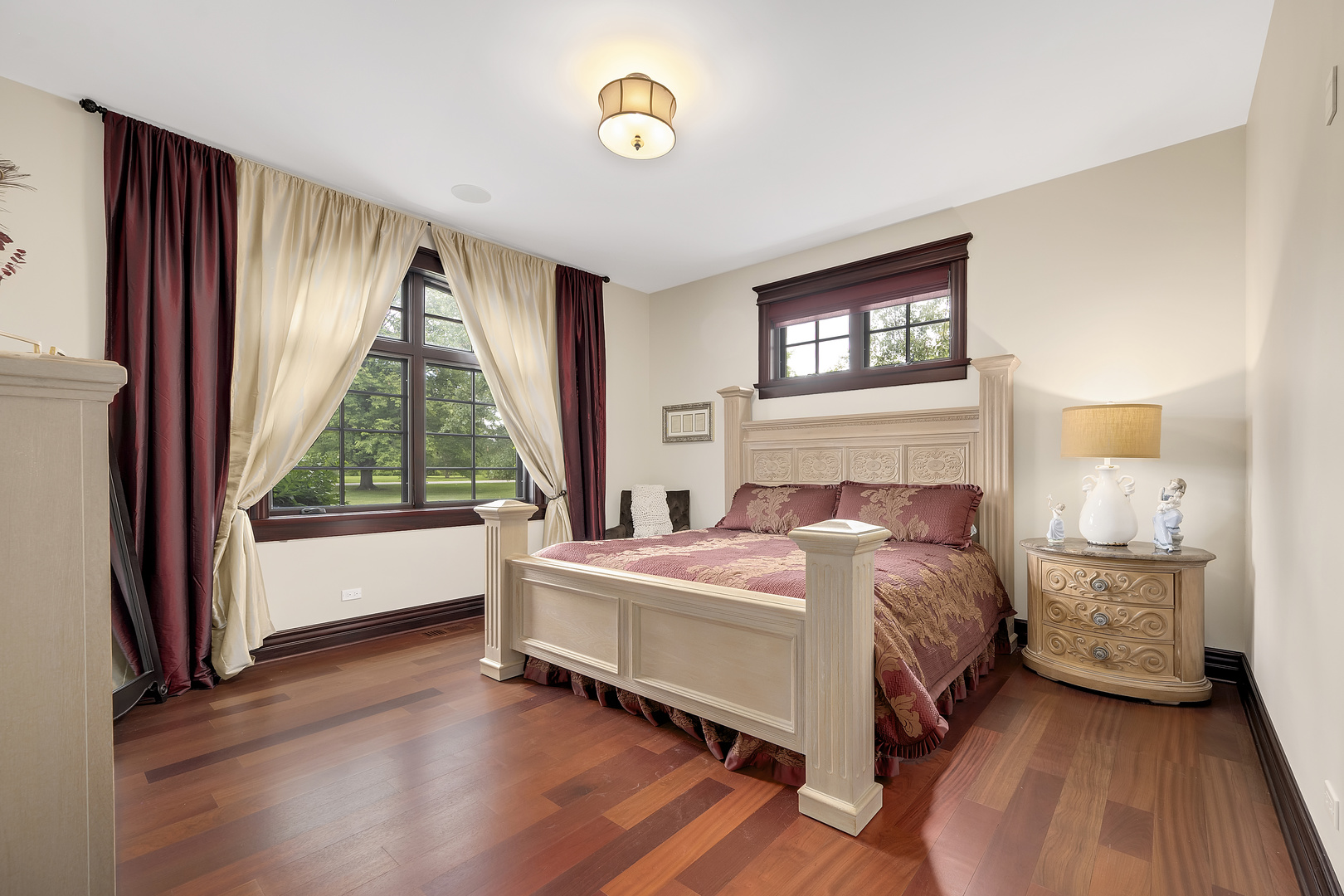 8511 Kearney Road Downers Grove, IL 60516 - Photo 58 of 71 a bedroom with a bed and a large window