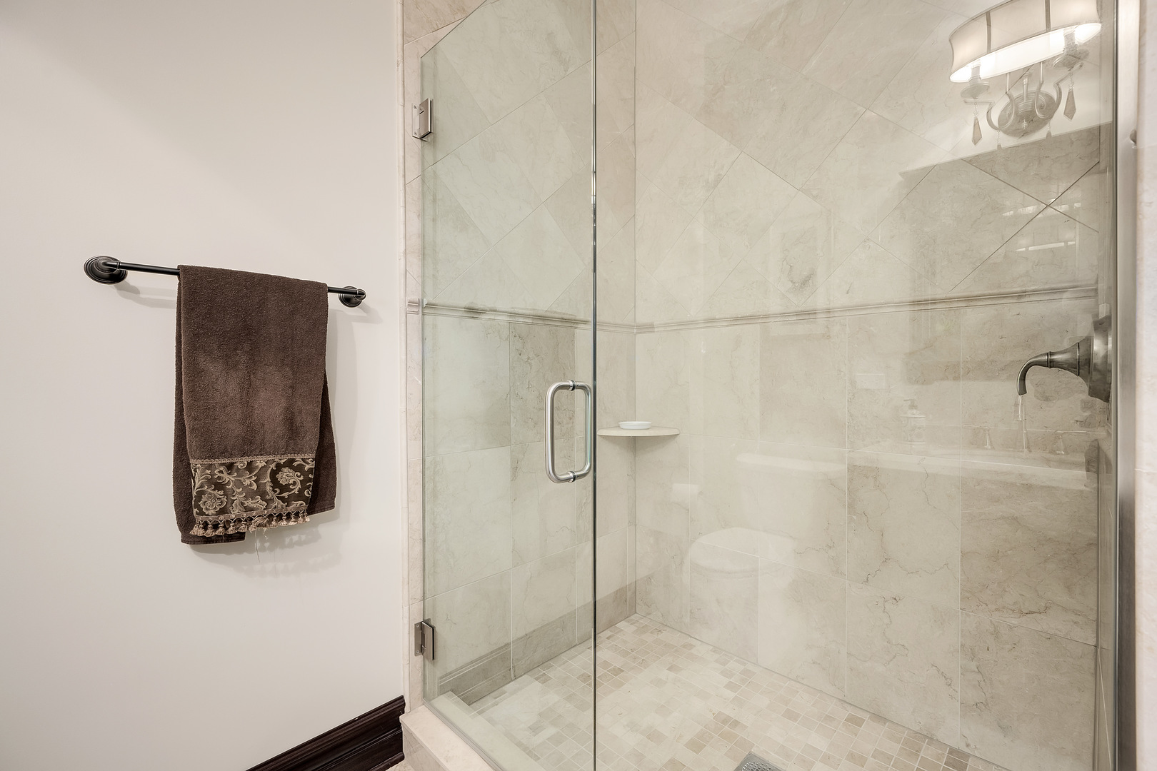 8511 Kearney Road Downers Grove, IL 60516 - Photo 60 of 71 a bathroom with a shower and a sink