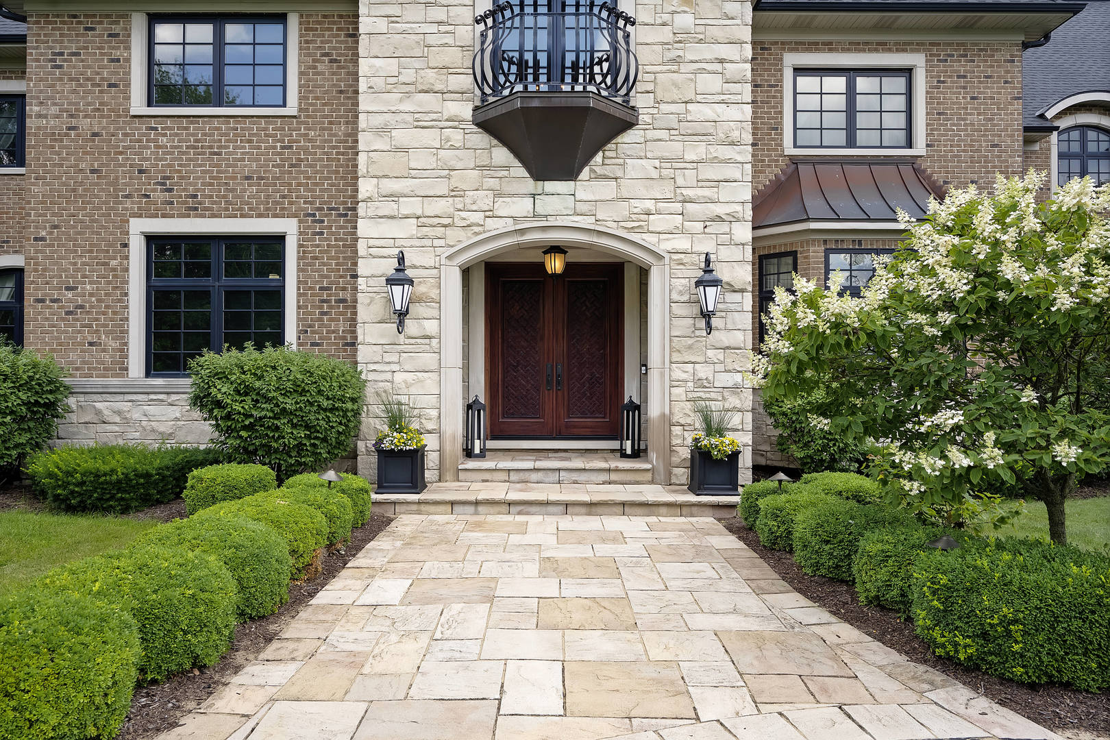 8511 Kearney Road Downers Grove, IL 60516 - Photo 8 of 71 a front view of a house with a garden