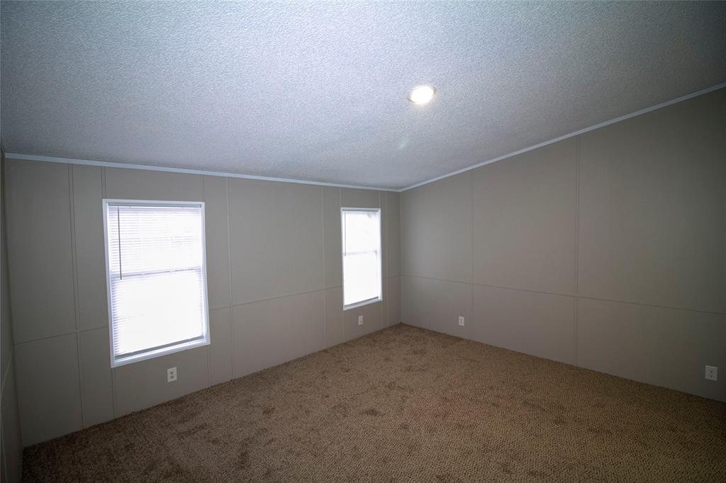909 Old Arcadia Road Minden, LA 71055 - Photo 11 of 21 an empty room with a window