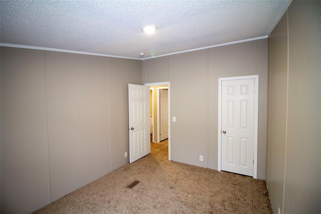 909 Old Arcadia Road Minden, LA 71055 - Photo 19 of 21 an empty room with closet area