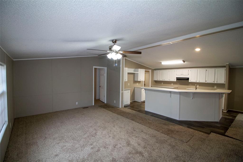 909 Old Arcadia Road Minden, LA 71055 - Photo 2 of 21 a view of a kitchen with a sink and cabinet area