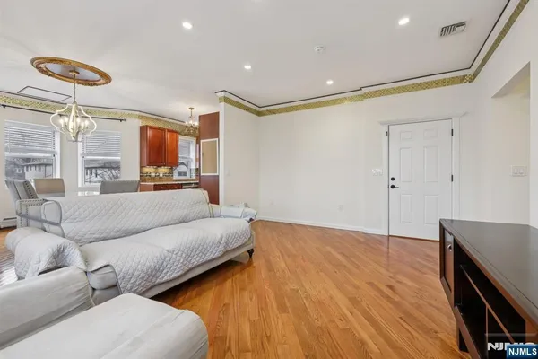 a bedroom with furniture and a fireplace