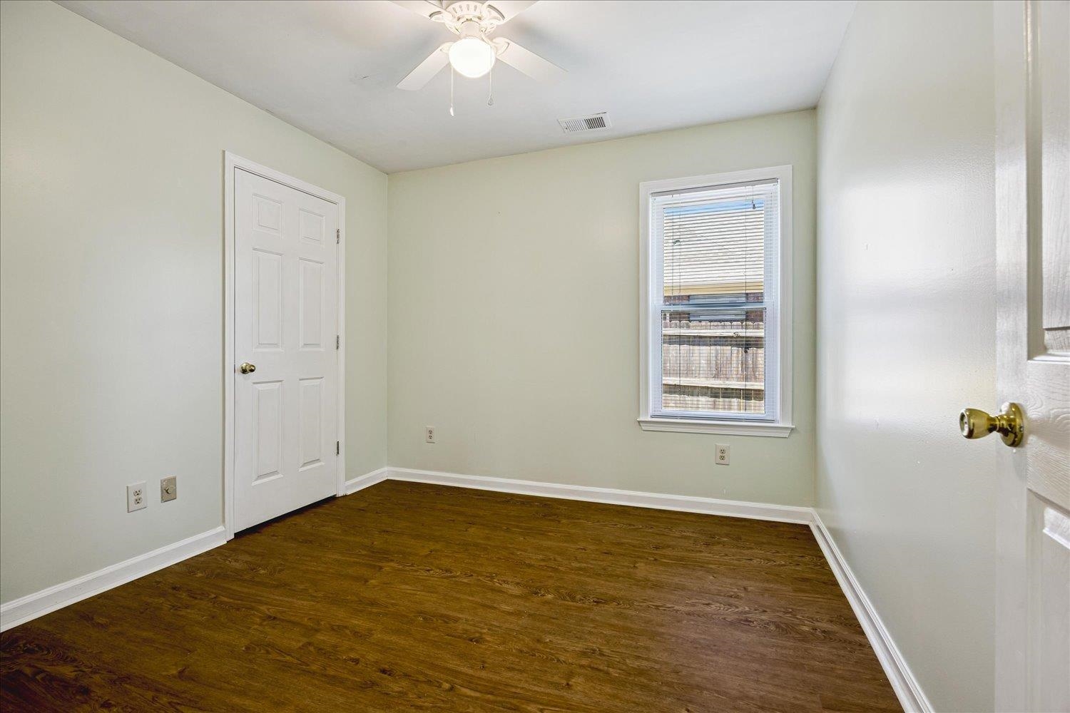 4654 Shadow Wick Lane Bartlett, TN 38002 - Photo 20 of 26 Room featuring wood-finish flooring, light-toned walls, and white trim