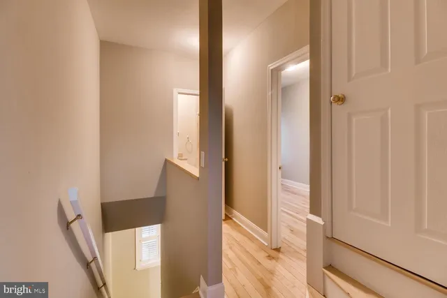 a view of a hallway with staircase