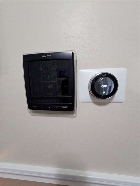 83 Merida Avenue Woonsocket, RI 02895 - Photo 26 of 46 Thermostat and weather reader, hygrometer outside on shed