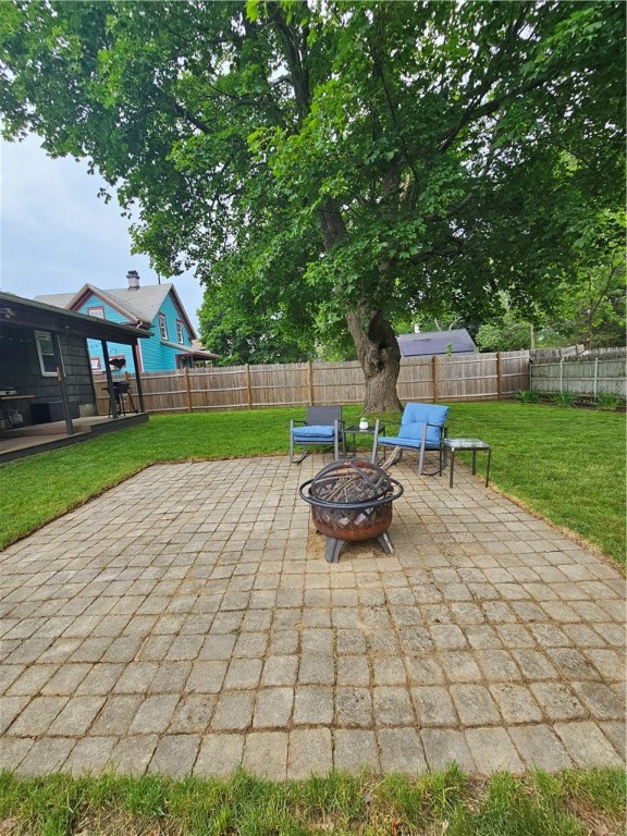 83 Merida Avenue Woonsocket, RI 02895 - Photo 33 of 46 Paved stones under mature maple tree