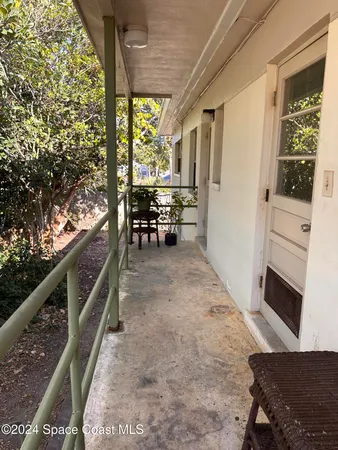 a bench sitting in front of a window