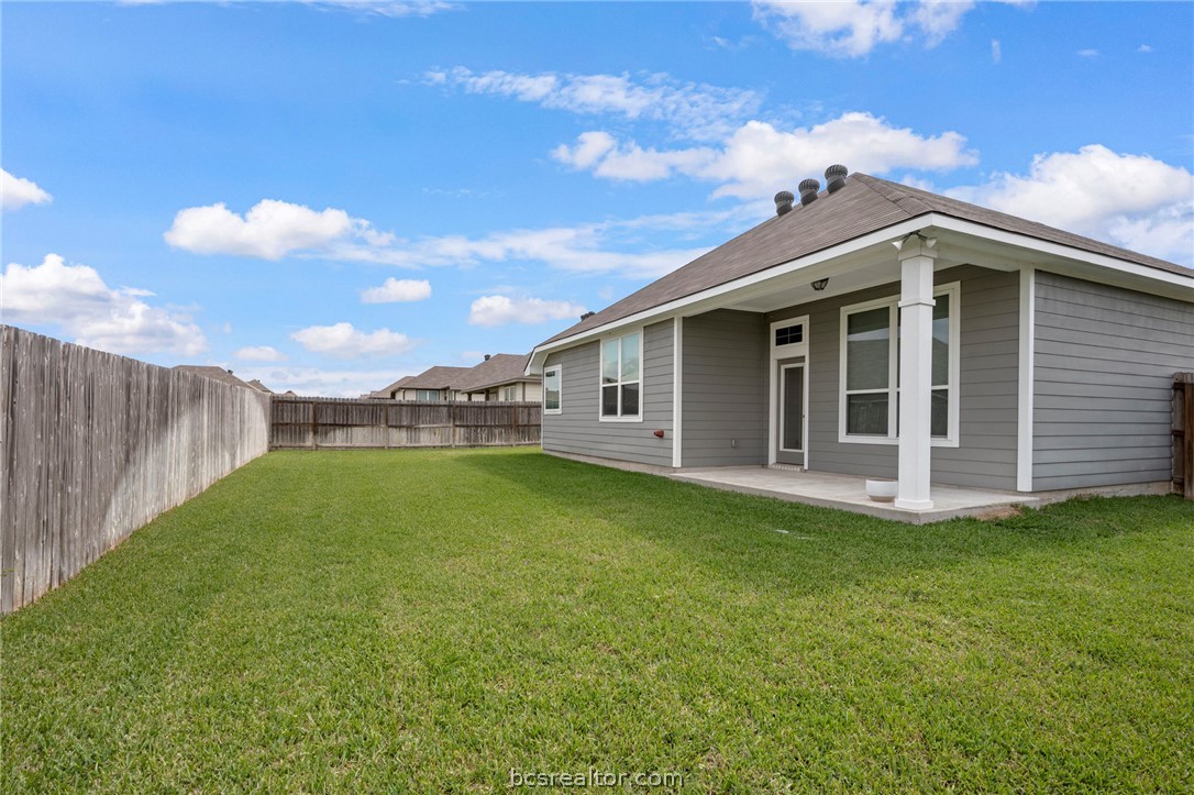 2038 Viva Road Bryan, TX 77807 - Photo 20 of 21 Spacious backyard offering privacy and room for outdoor entertaining.