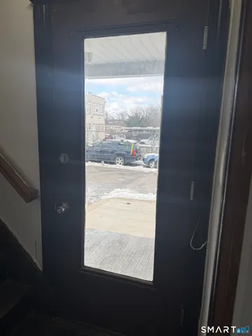 a view of an empty room with a window