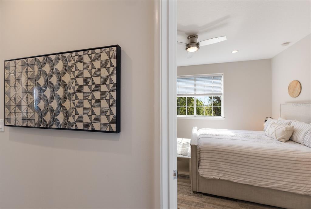 8035 St Simons Street, Unit 8035 University Park, FL 34201 - Photo 20 of 39 a bedroom with a bed and a window