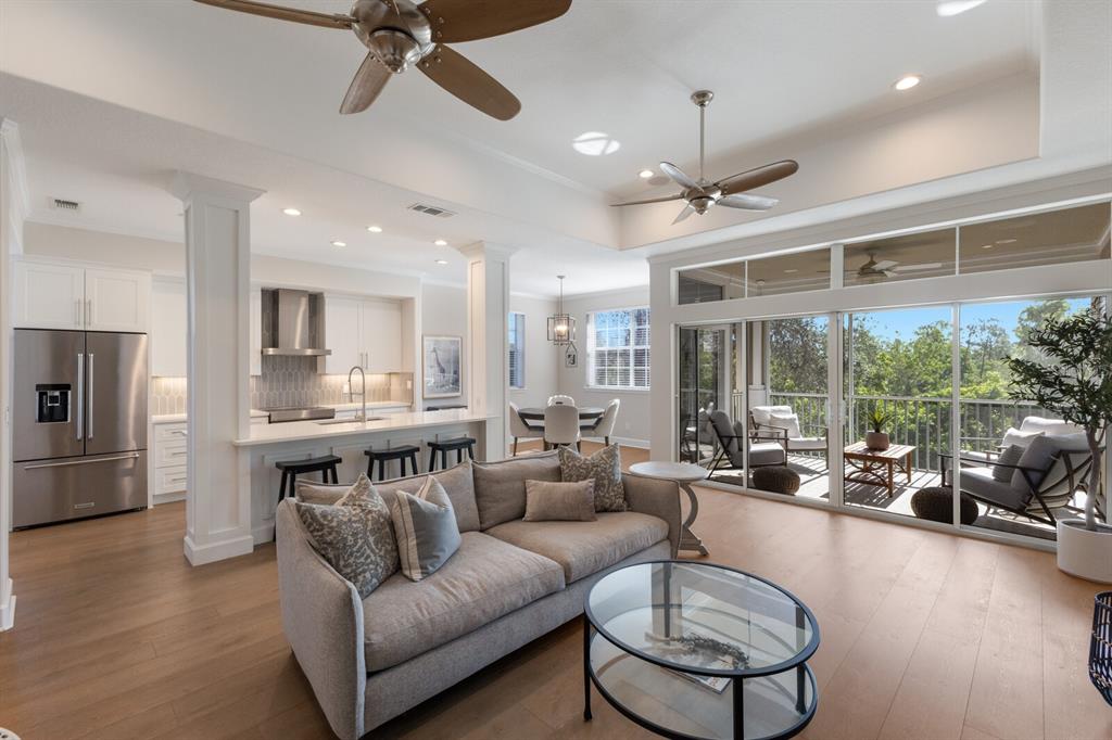 8035 St Simons Street, Unit 8035 University Park, FL 34201 - Photo 10 of 39 a living room with furniture and a large window
