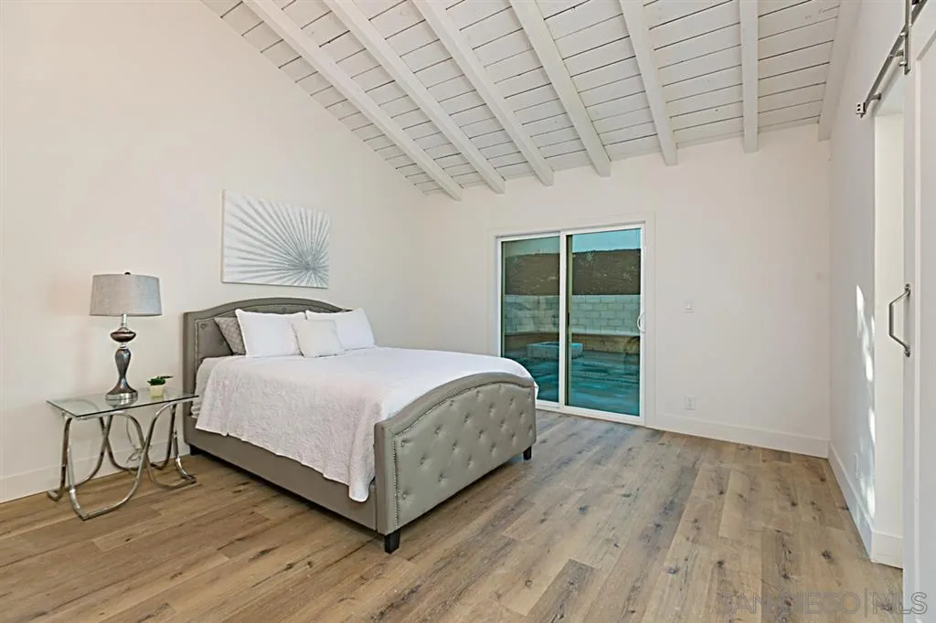 2760 Lone Jack Road Encinitas, CA 92024 - Photo 12 of 25 a bedroom with a bed and a window