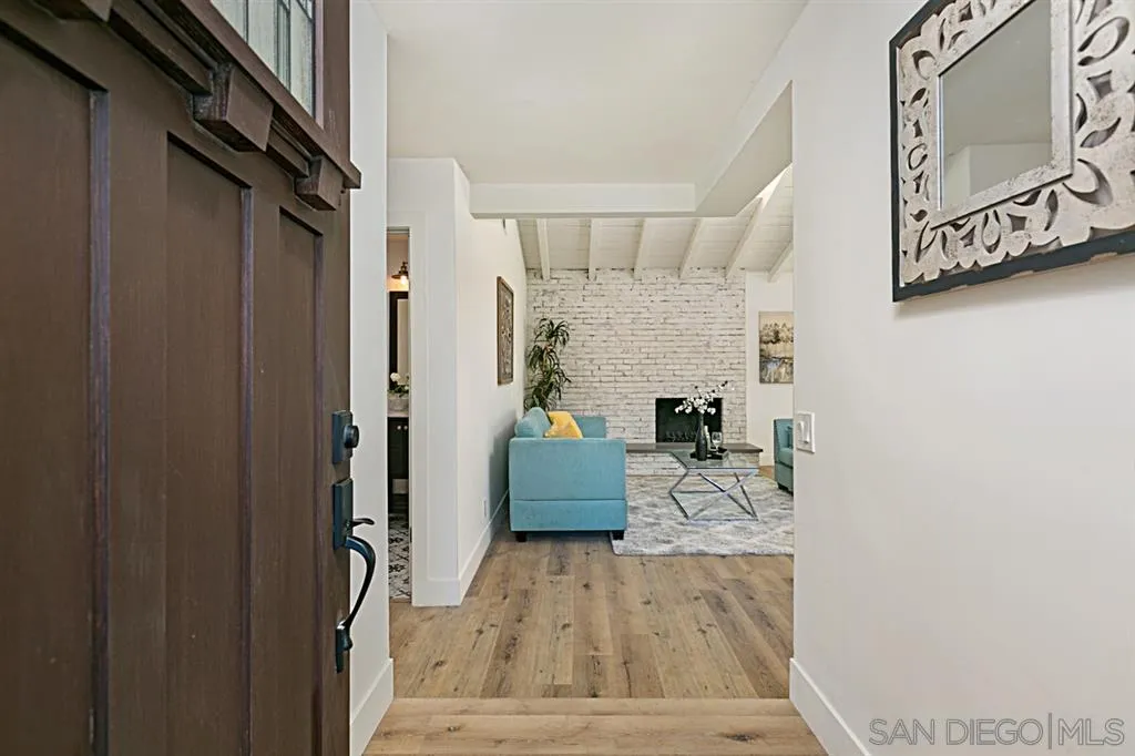 2760 Lone Jack Road Encinitas, CA 92024 - Photo 2 of 25 a living room with furniture and a wooden floor