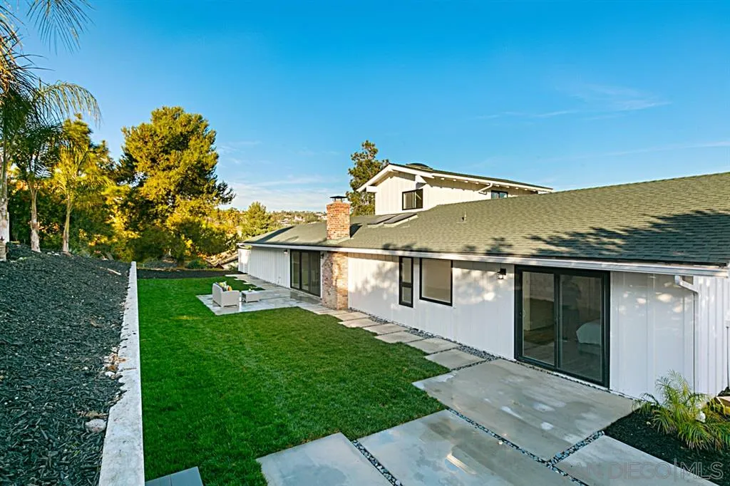 2760 Lone Jack Road Encinitas, CA 92024 - Photo 21 of 25 a front view of a house with garden