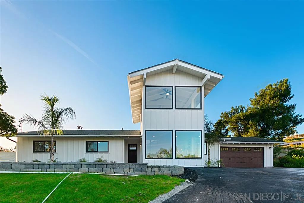 2760 Lone Jack Road Encinitas, CA 92024 - Photo 24 of 25 a front view of a house with a yard