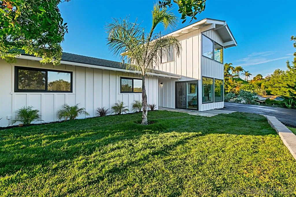 2760 Lone Jack Road Encinitas, CA 92024 - Photo 25 of 25 a front view of a house with a garden and plants
