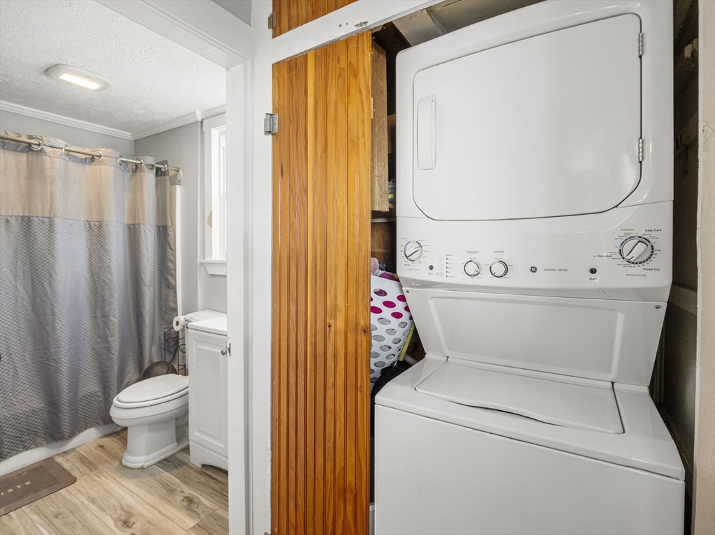 95 South Highland Street Lowell, MA 01852 - Photo 19 of 41 a view of bathroom with a toilet and a shower
