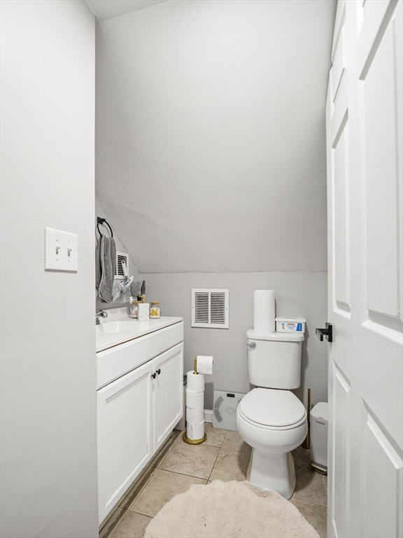95 South Highland Street Lowell, MA 01852 - Photo 29 of 41 a room with a toilet and a sink
