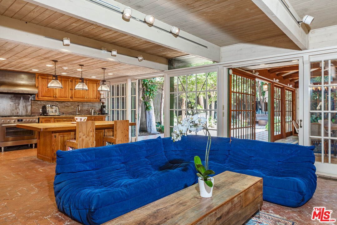 23441 Malibu Colony Road Malibu, CA 90265 - Photo 11 of 43 a living room with furniture and a large window
