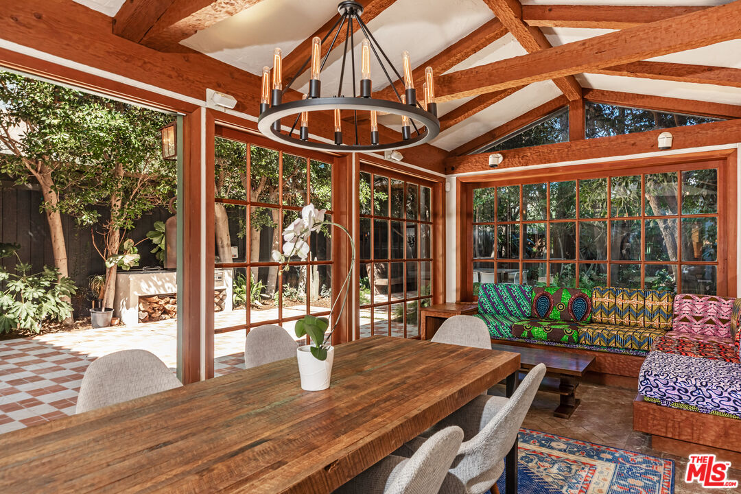 23441 Malibu Colony Road Malibu, CA 90265 - Photo 12 of 43 a view of a patio with a table and chairs