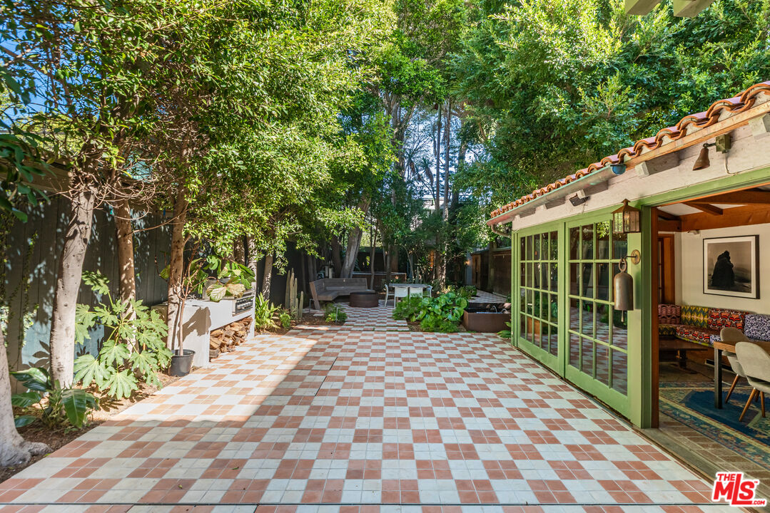 23441 Malibu Colony Road Malibu, CA 90265 - Photo 13 of 43 a front view of a house with a garden