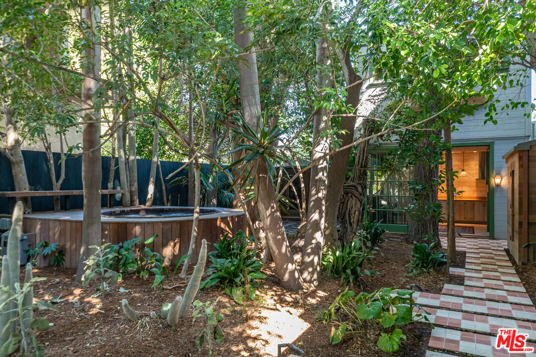 23441 Malibu Colony Road Malibu, CA 90265 - Photo 17 of 43 a view of a house with backyard and sitting area