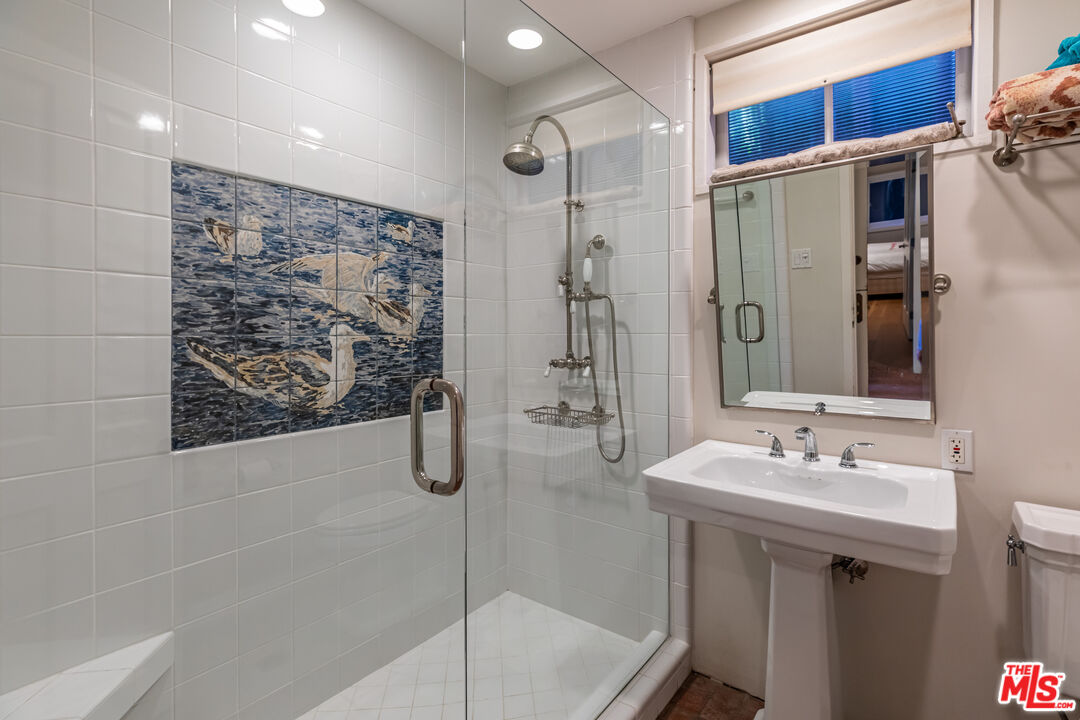 23441 Malibu Colony Road Malibu, CA 90265 - Photo 26 of 43 a bathroom with a shower and a sink