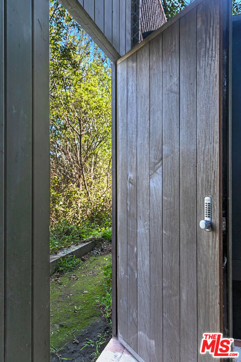 23441 Malibu Colony Road Malibu, CA 90265 - Photo 37 of 43 a bathroom with a shower and a window
