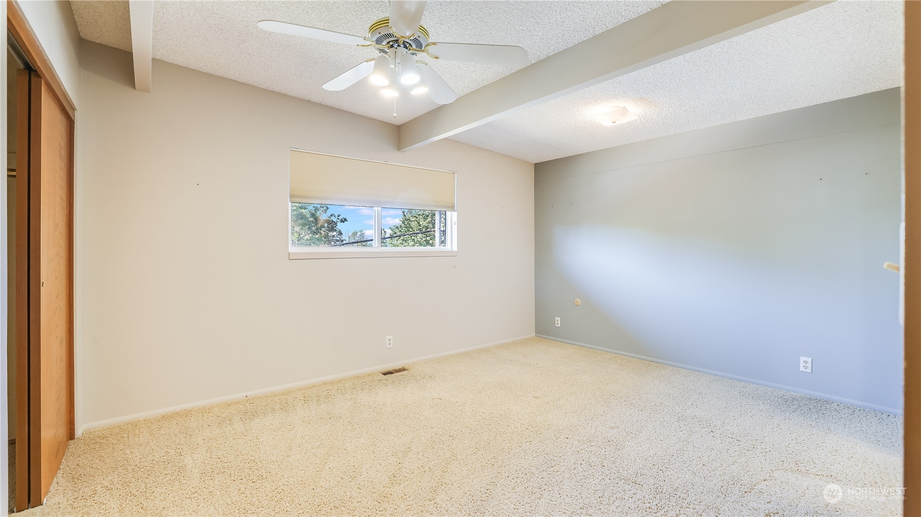 678 Sunset Boulevard Northeast Renton, WA 98056 - Photo 21 of 31 a view of an empty room with a window