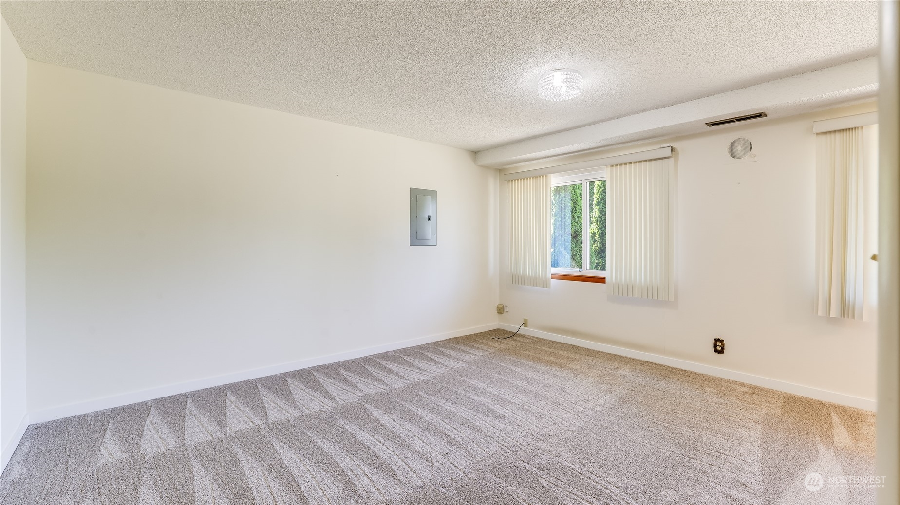 678 Sunset Boulevard Northeast Renton, WA 98056 - Photo 25 of 31 an empty room with windows