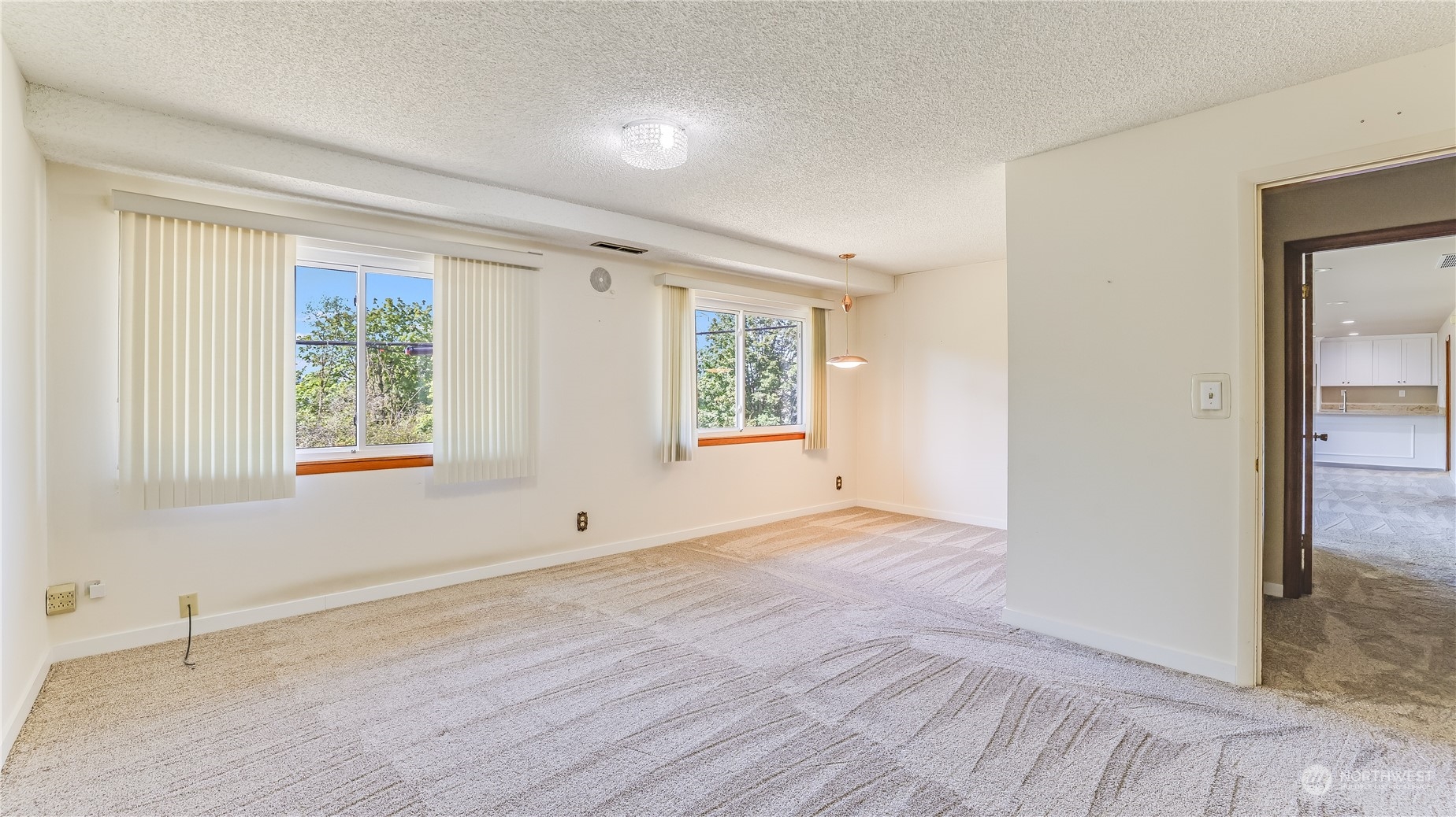 678 Sunset Boulevard Northeast Renton, WA 98056 - Photo 26 of 31 a view of an empty room with a window